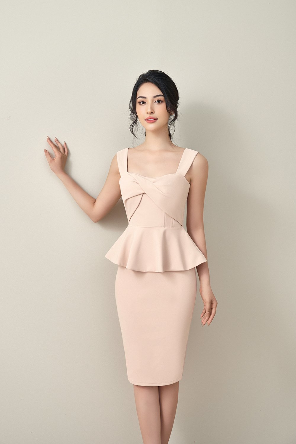 Calliope Twisted Bust Peplum Pencil Dress in Dusty Pink