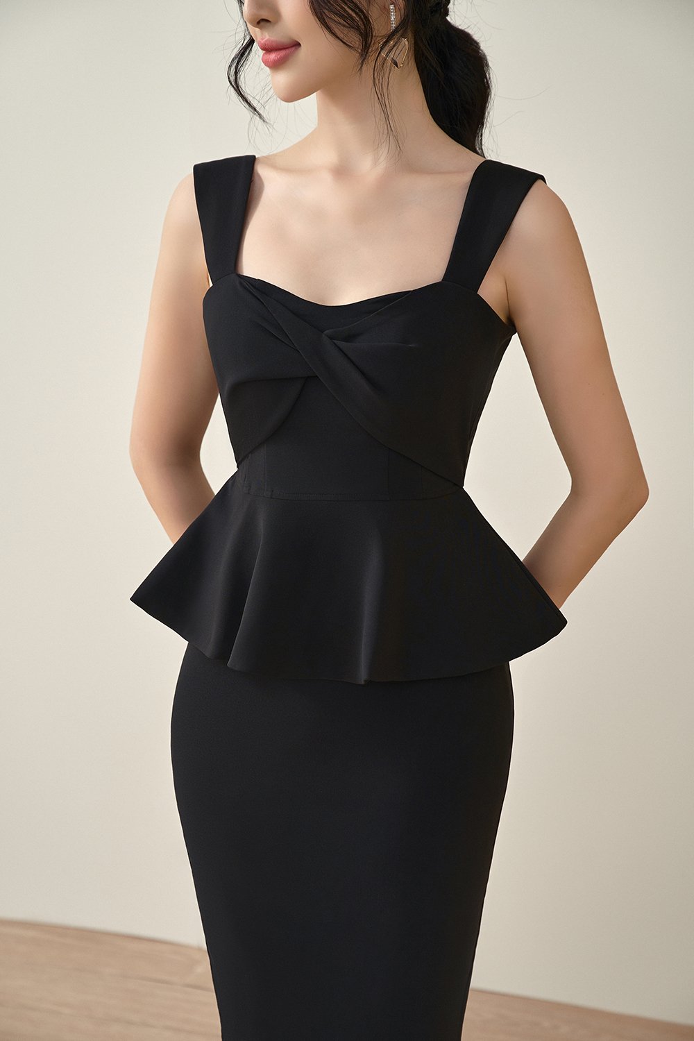 Calliope Twisted Bust Peplum Pencil Dress in Classic Black