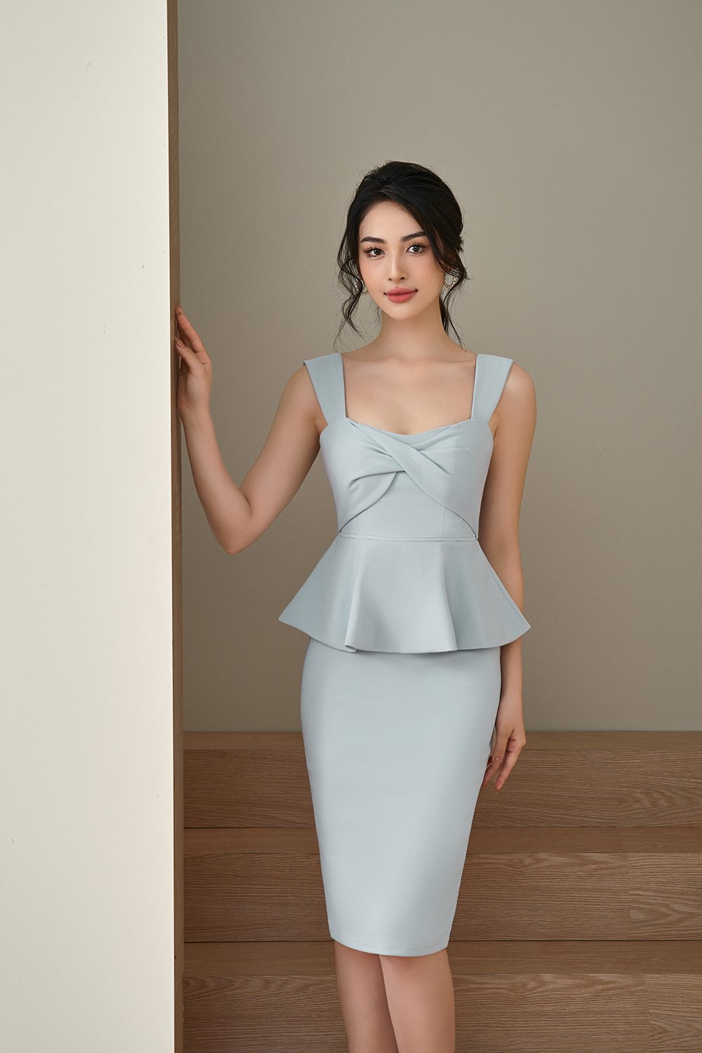 Calliope Twisted Bust Peplum Pencil Dress in Dusty Blue