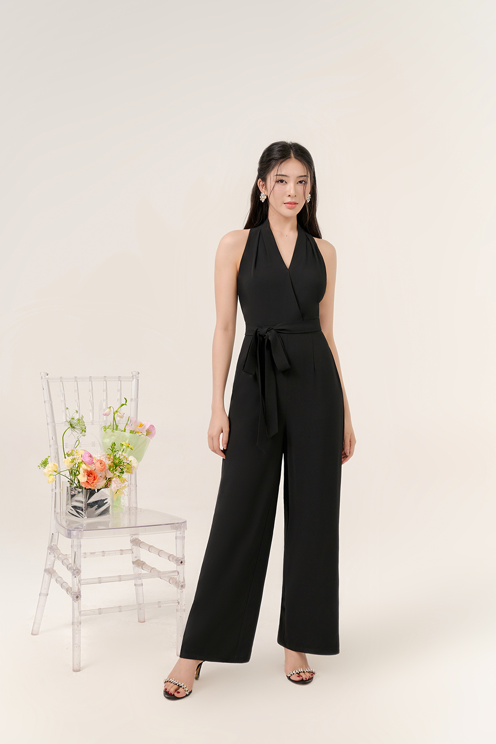Juni Pleated V-Neck Jumpsuit with Sash Belt in Classic Black | Chello