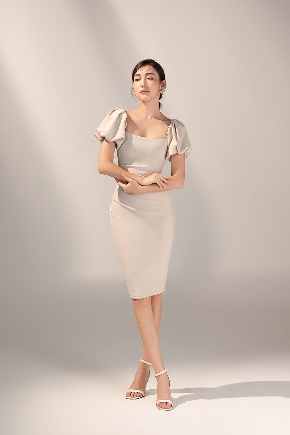 Calista Padded Puffy Sleeves Ruched Midi Dress in Ivory