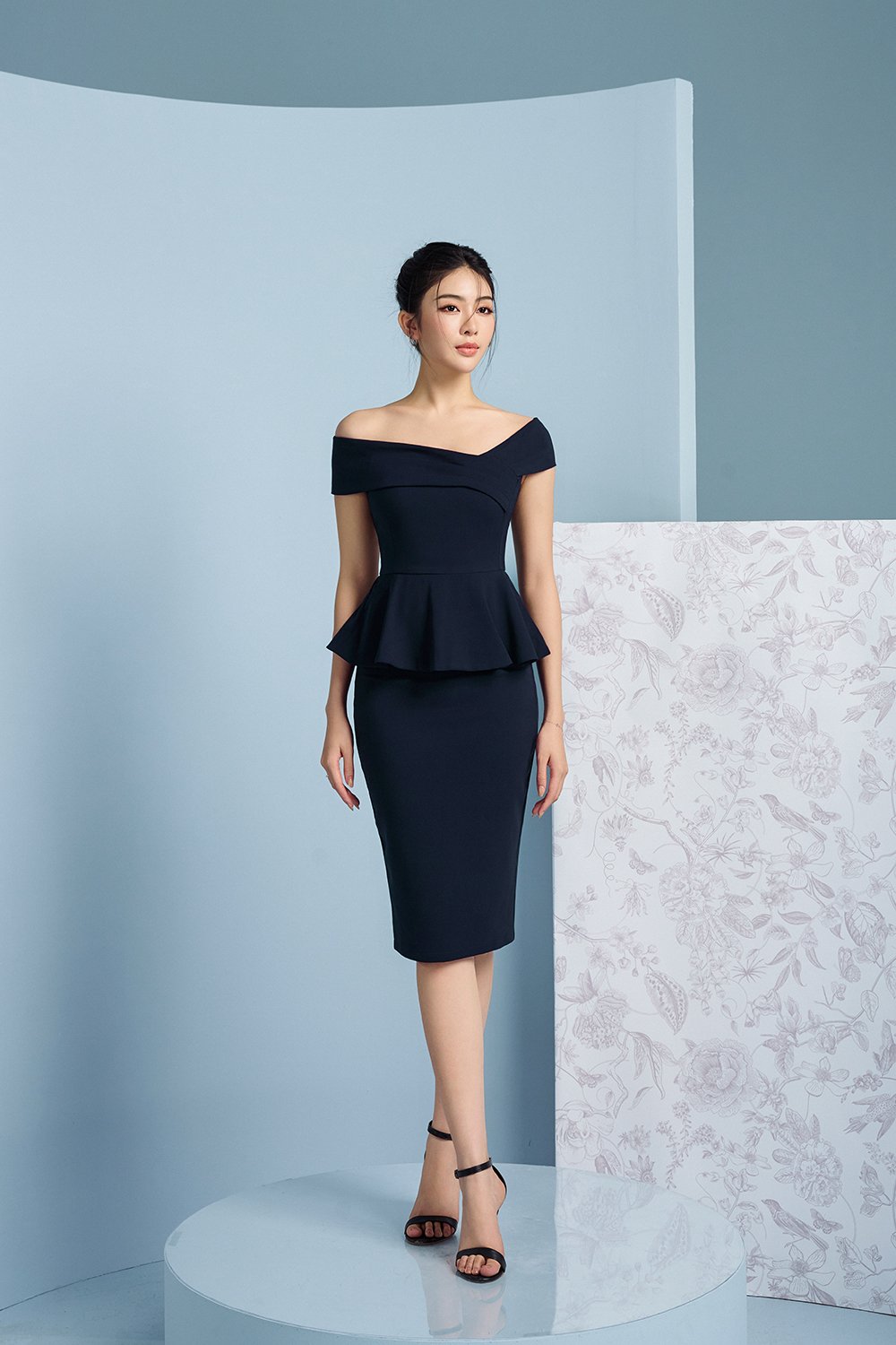 Lucille Off the Shoulder Pepum Pencil Dress in Navy Blue