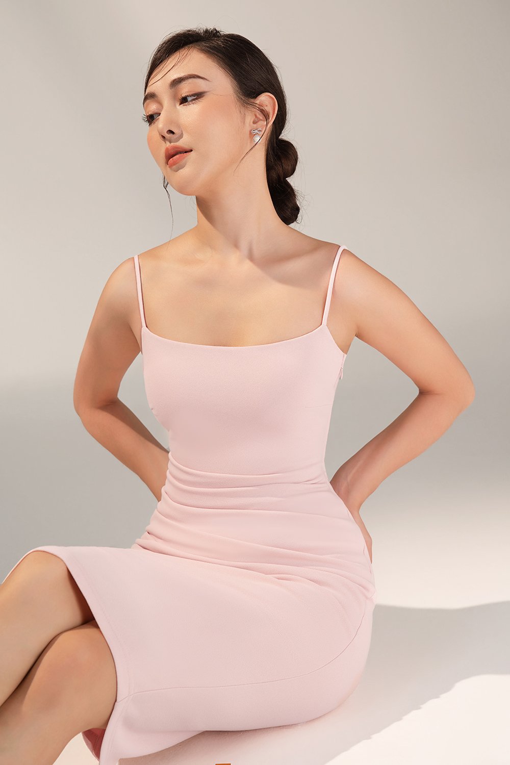 Ellery Padded Twist Back Ruched Dress in Blush Pink