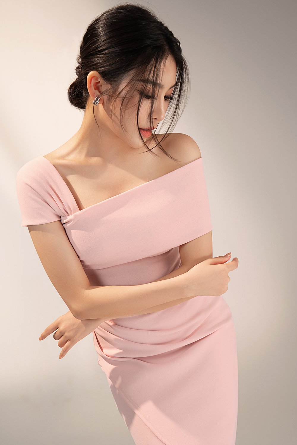 Tiana Padded Asymmetrical Cropped Top in Ballet Pink