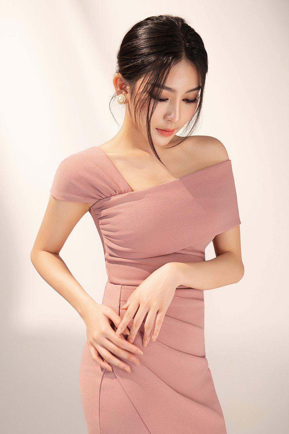 Tiana Padded Asymmetrical Cropped Top in Dusty Rose