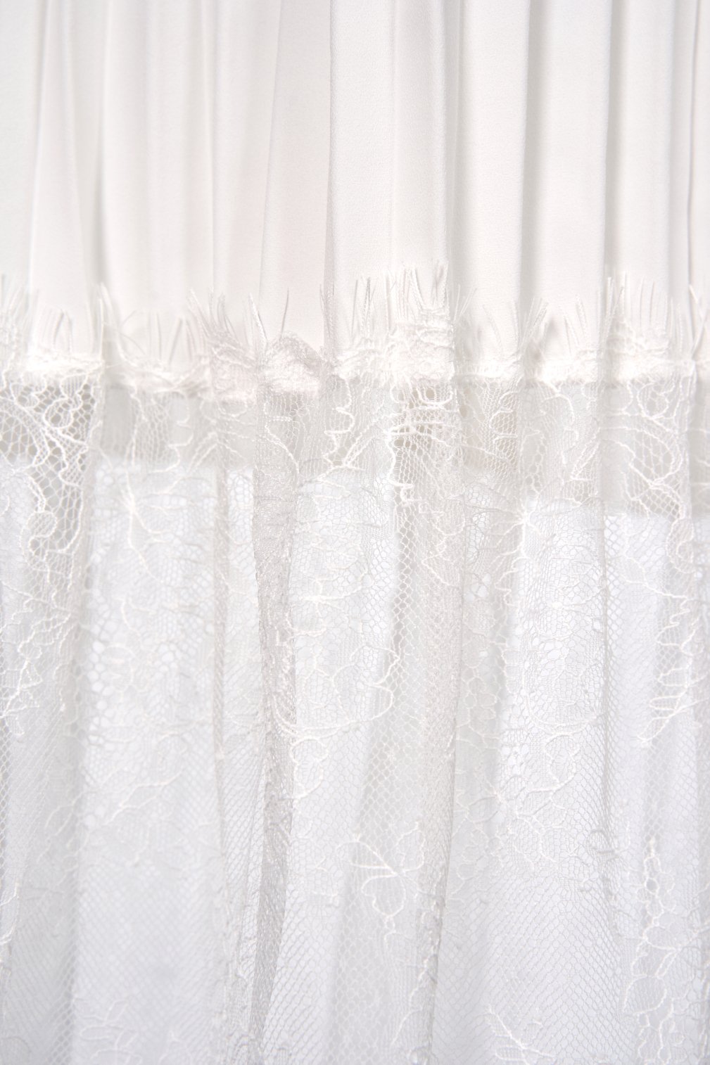 Elora Pleated Lace Panel Midi Skirt In Iconic White