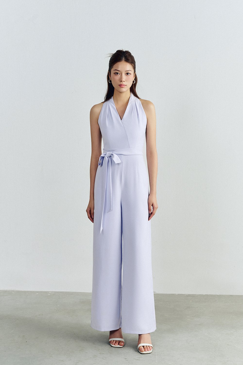Juni Pleated V-Neck Jumpsuit with Sash Belt in Lavender