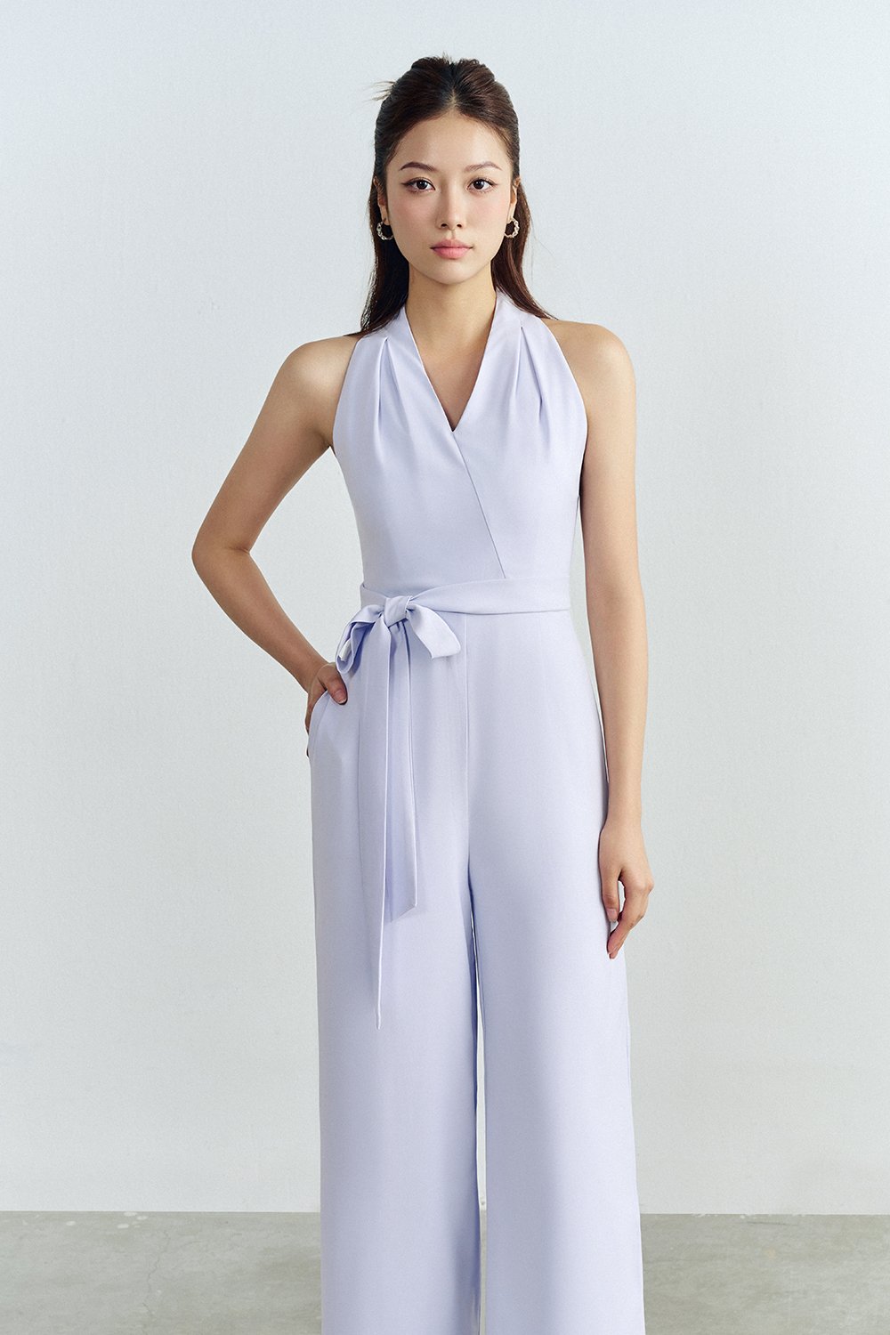 Juni Pleated V-Neck Jumpsuit with Sash Belt in Lavender