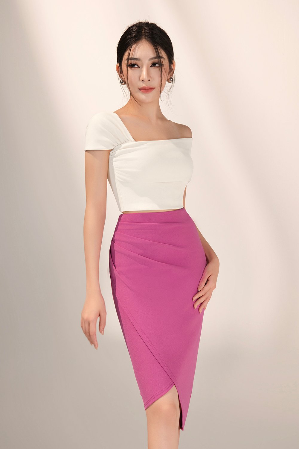 Tiana Padded Asymmetrical Cropped Top in Ivory