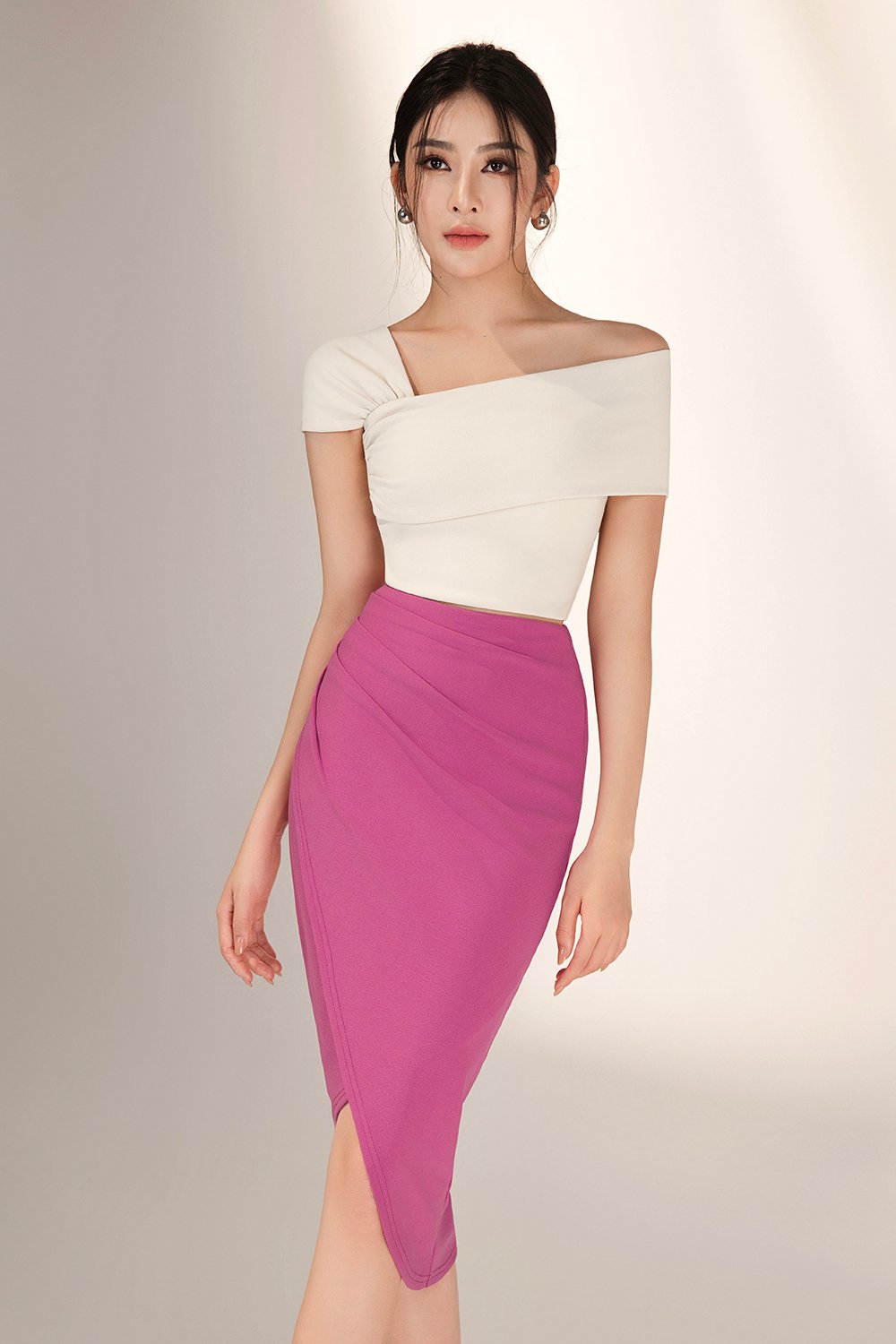 Tiana Padded Asymmetrical Cropped Top in Ivory