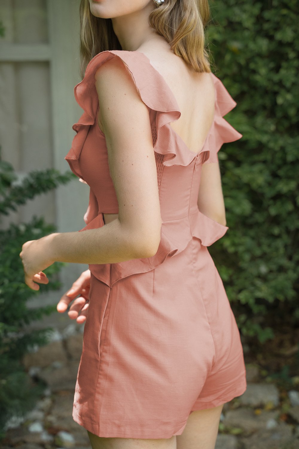 Monique Padded V-Neck Ruffle Cut-Out Romper in Monticello Peach