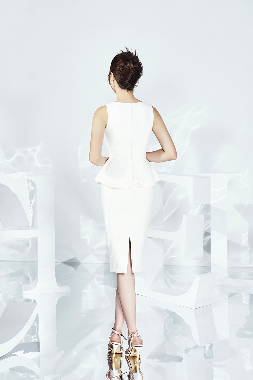 Kinley Sleek Peplum Pencil Dress in Iconic White