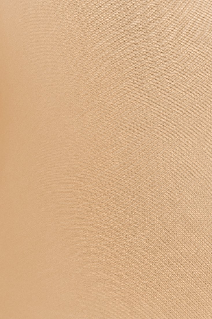 Tyra Asymmetrical Long Sleeves Top in Bisque