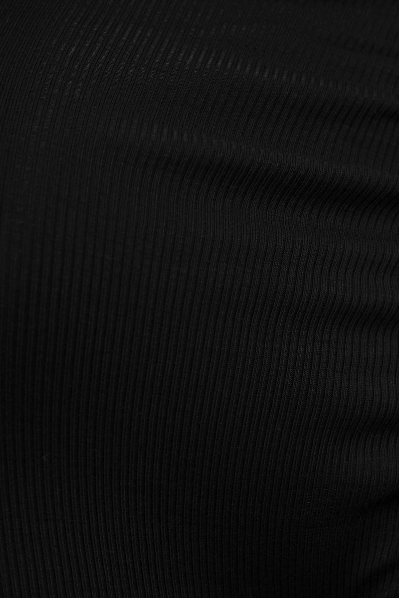 Perline Asymmetrical Crop Top in Classic Black