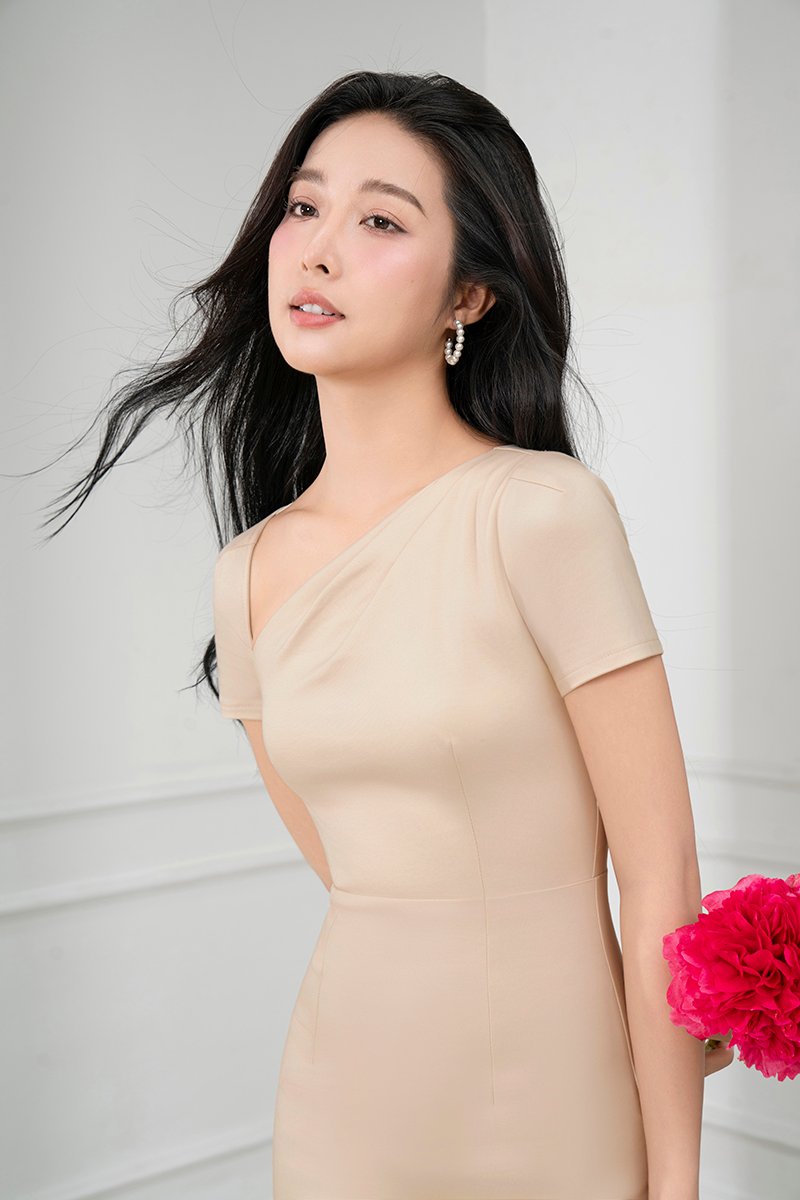 Arin Padded Asymmetrical Pencil Dress in Light Bisque