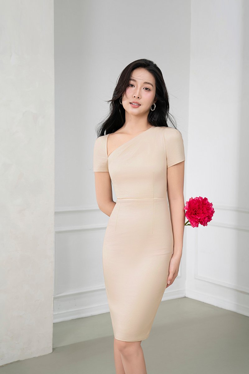 Arin Padded Asymmetrical Pencil Dress in Light Bisque