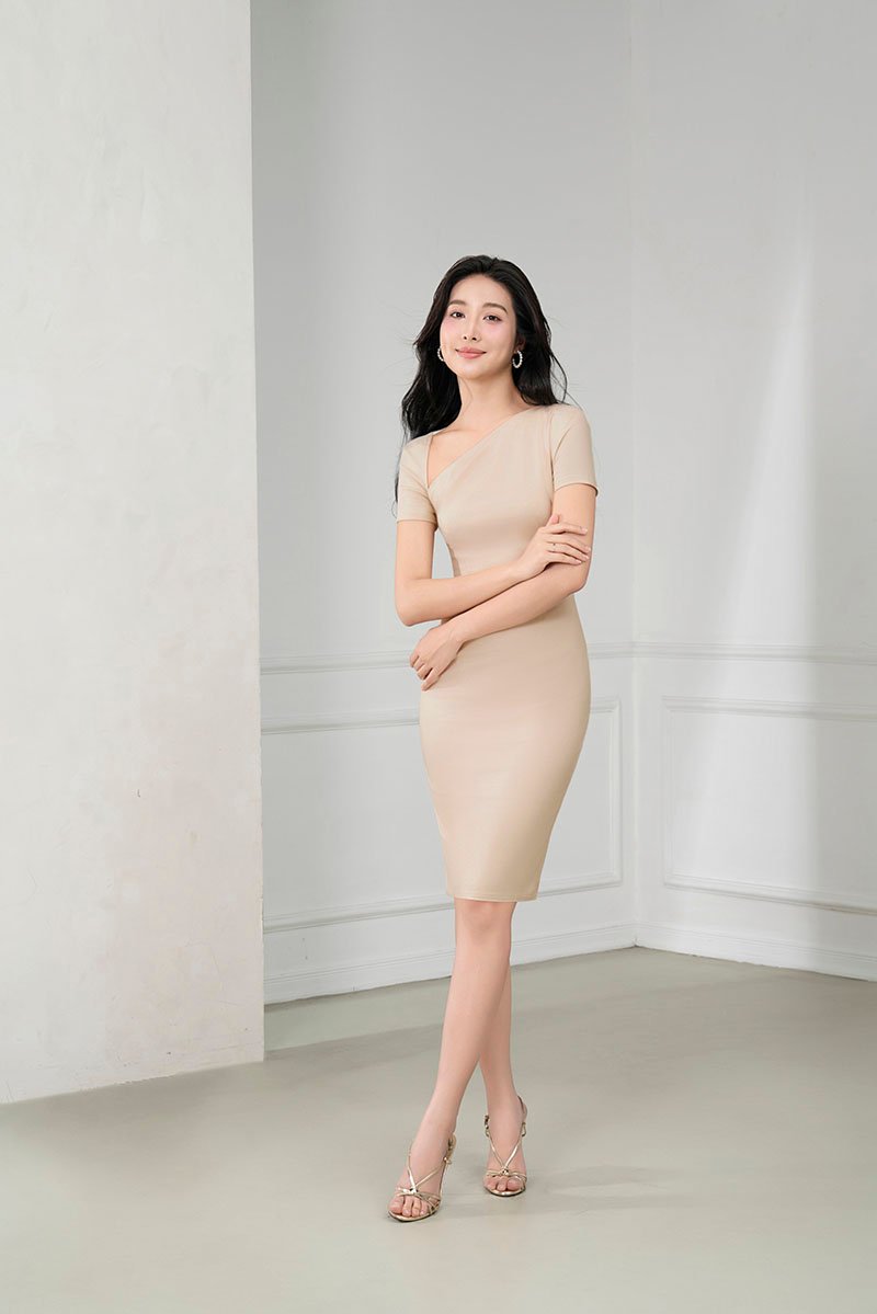 Arin Padded Asymmetrical Pencil Dress in Light Bisque