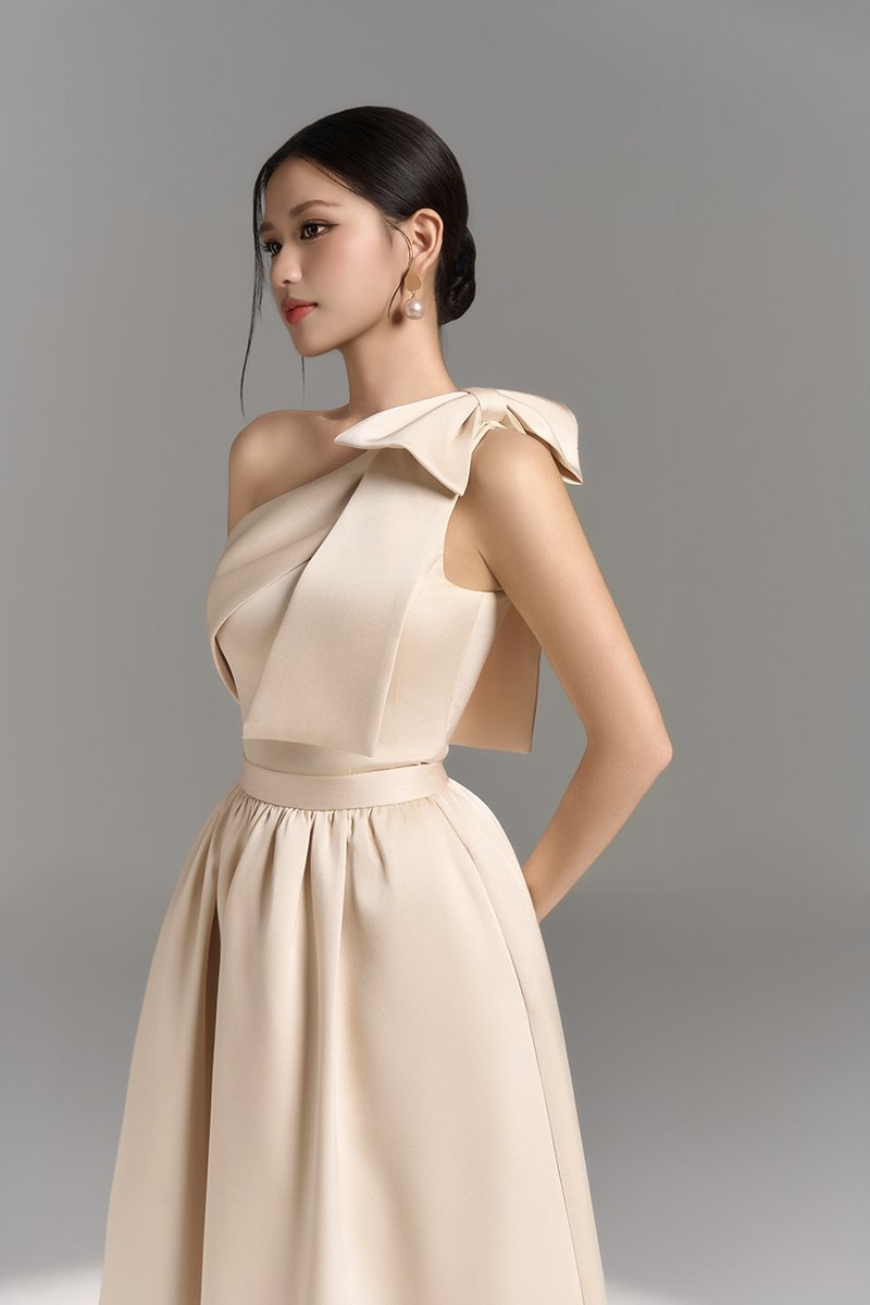 Lumira Padded Bow Toga Top in Peach Champagne