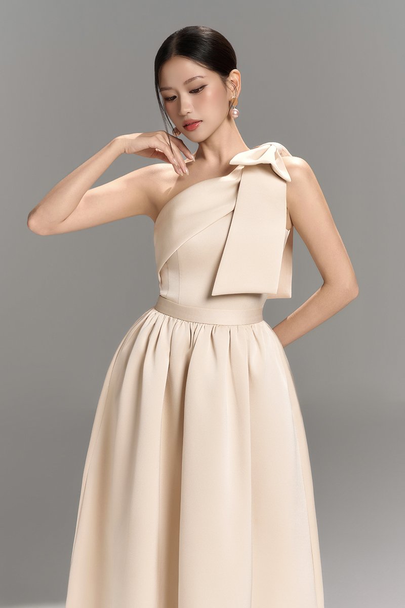 Lumira Padded Bow Toga Top in Peach Champagne