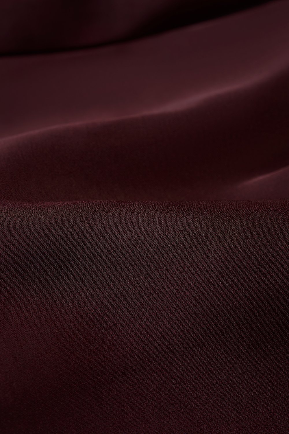 Aviva Sateen Pleated High Waist Shorts in Pinot Noir