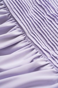 Xena Padded Puff Sleeves Pleated Mini Dress in Lilac Haze