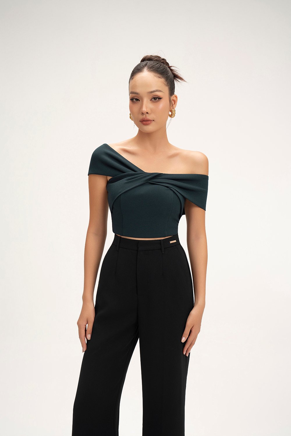 Elaine Padded Asymmetrical Twist Top in Emerald Green