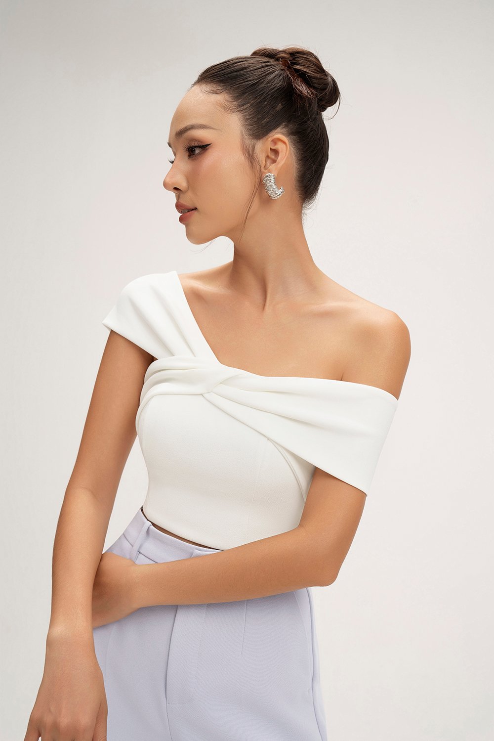 Elaine Padded Asymmetrical Twist Top in Iconic White