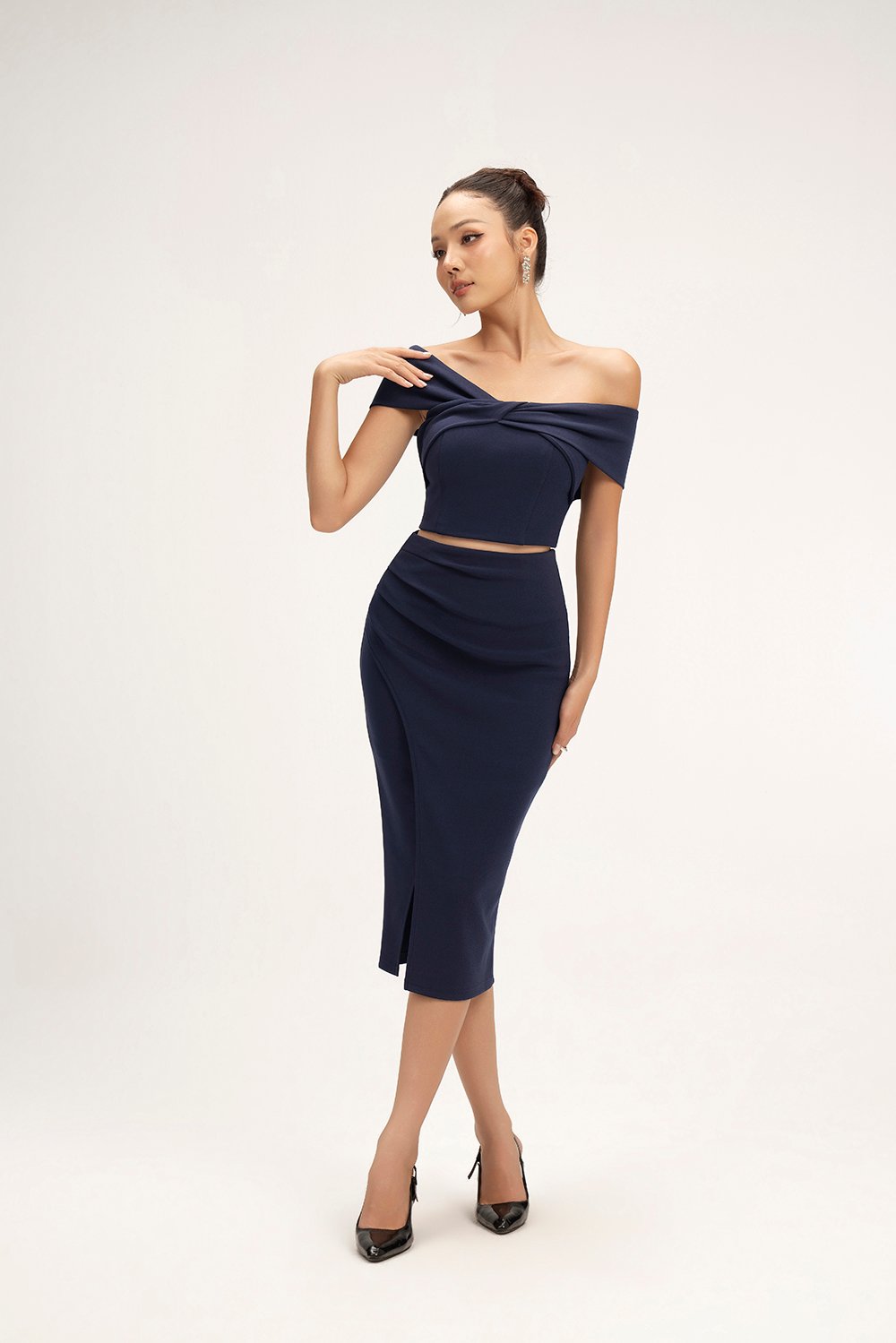 Elaine Padded Asymmetrical Twist Top in Navy Blue