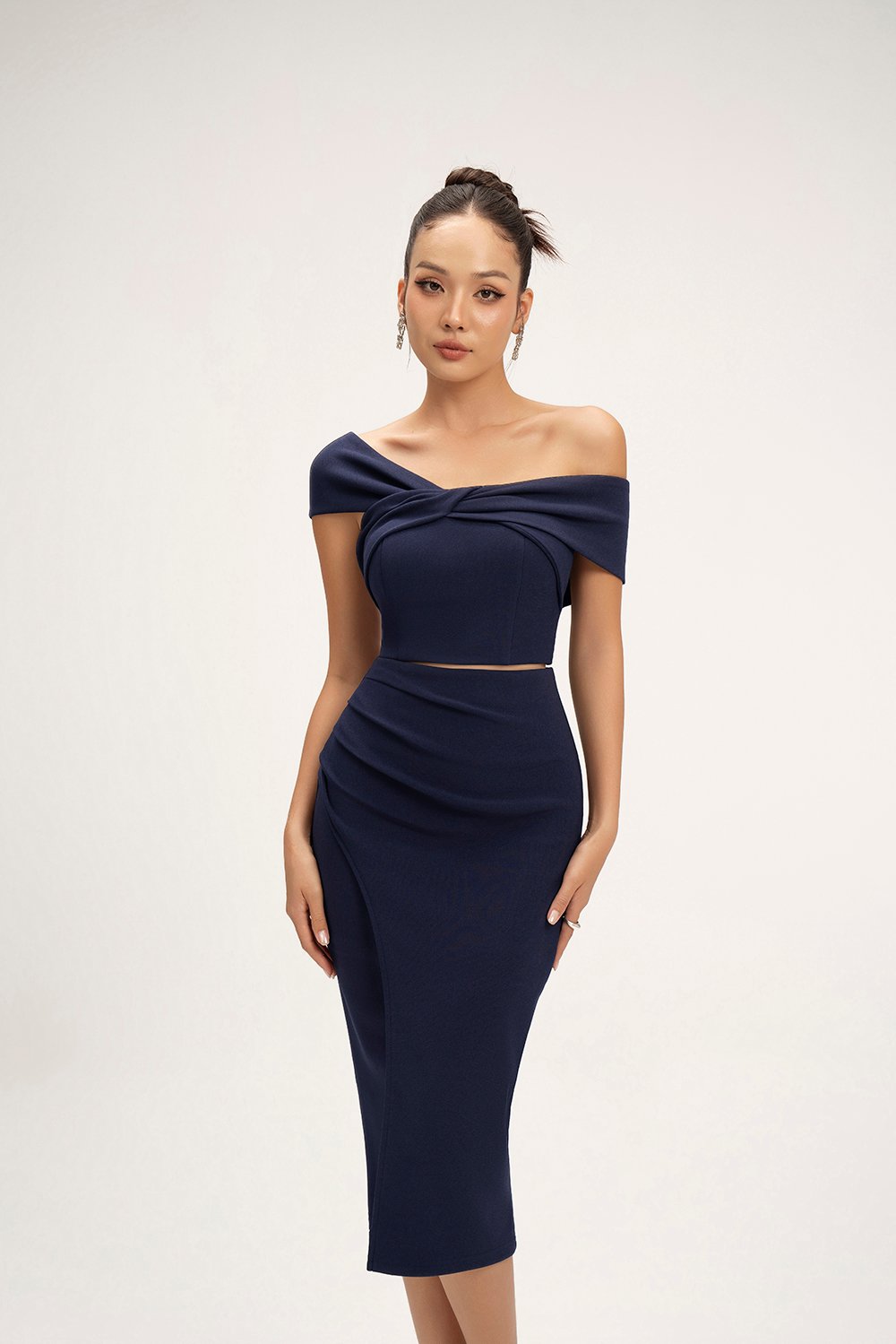 Elaine Padded Asymmetrical Twist Top in Navy Blue