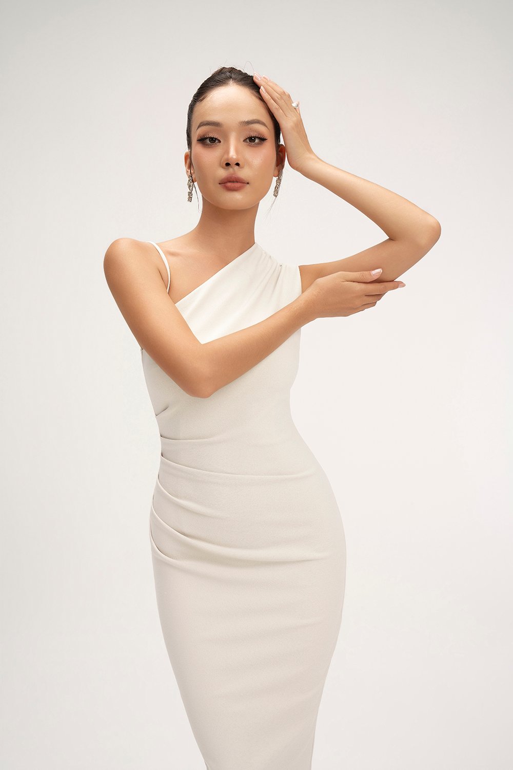 Gaia Padded Asymmetrical Ruched Midi Dress in Ivory