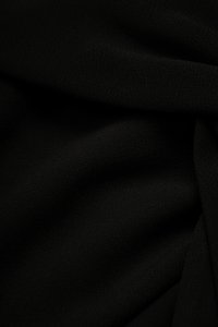 Elaine Padded Asymmetrical Twist Top in Classic Black