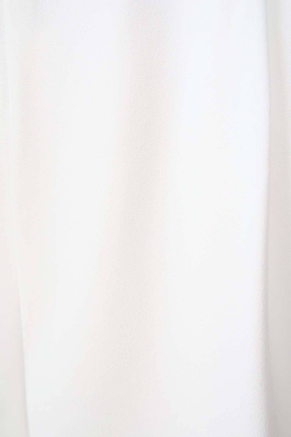 Aurel Crossover Halter Jumpsuit in Iconic White