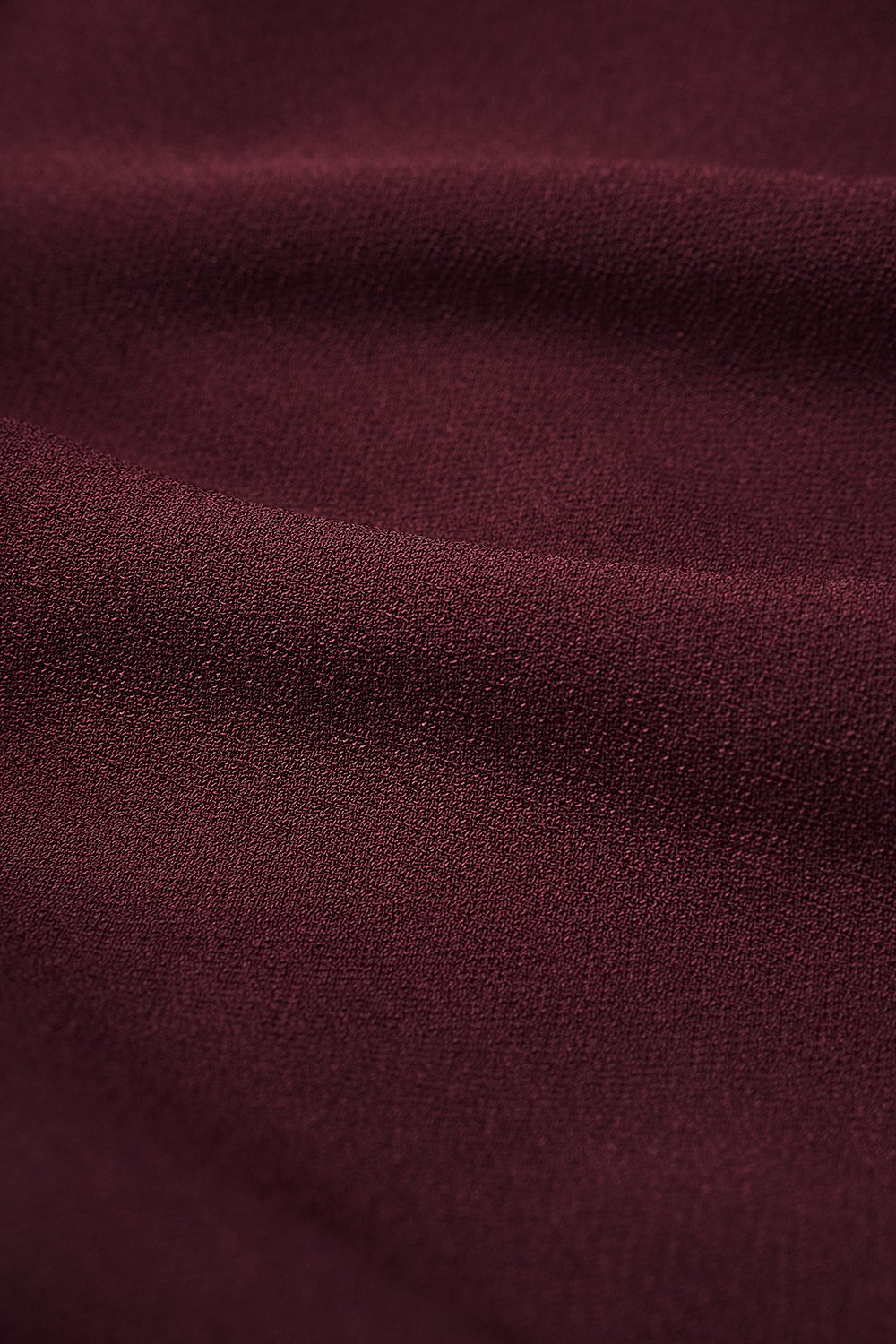 Lucinda Padded Toga Asymmetrical Top in Burgundy