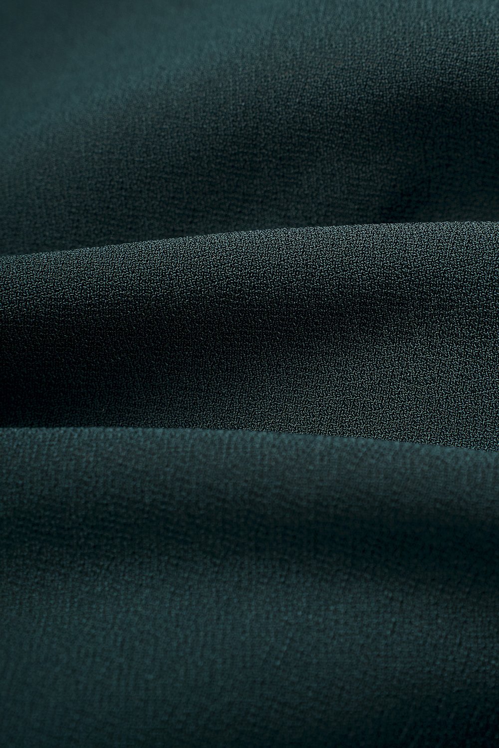 Rachel Padded Asymmetrical Wrap Top in Emerald Green
