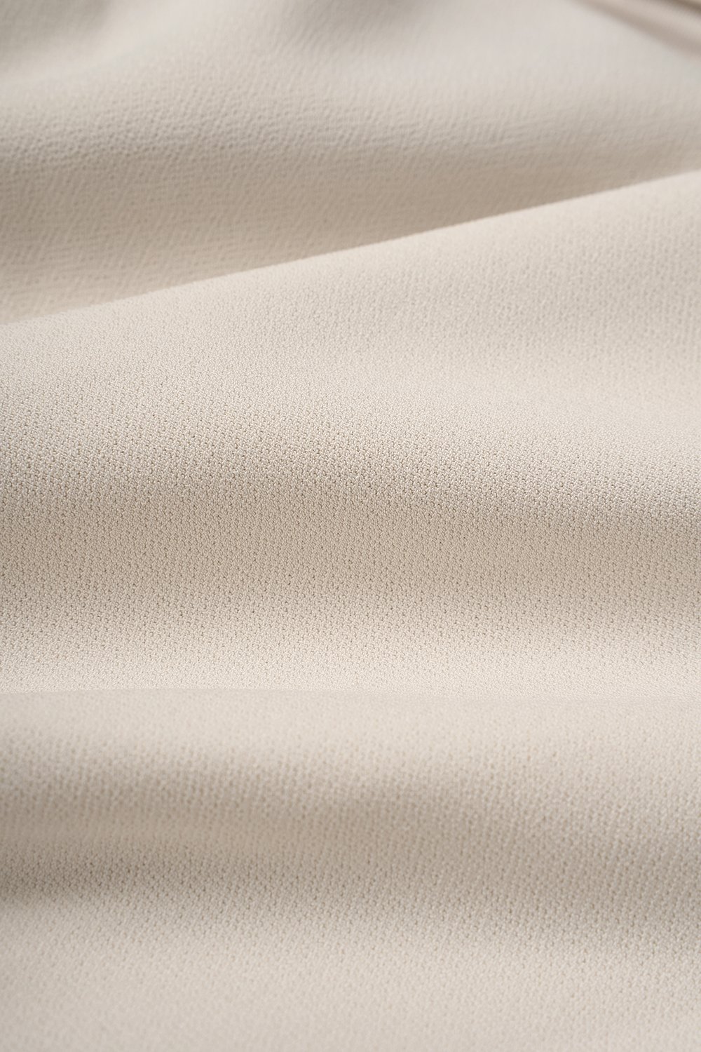 Rachel Padded Asymmetrical Wrap Top in Ivory