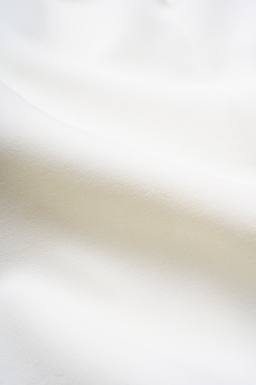 Avril Asymmetrical Cold Shoulder Top in Iconic White