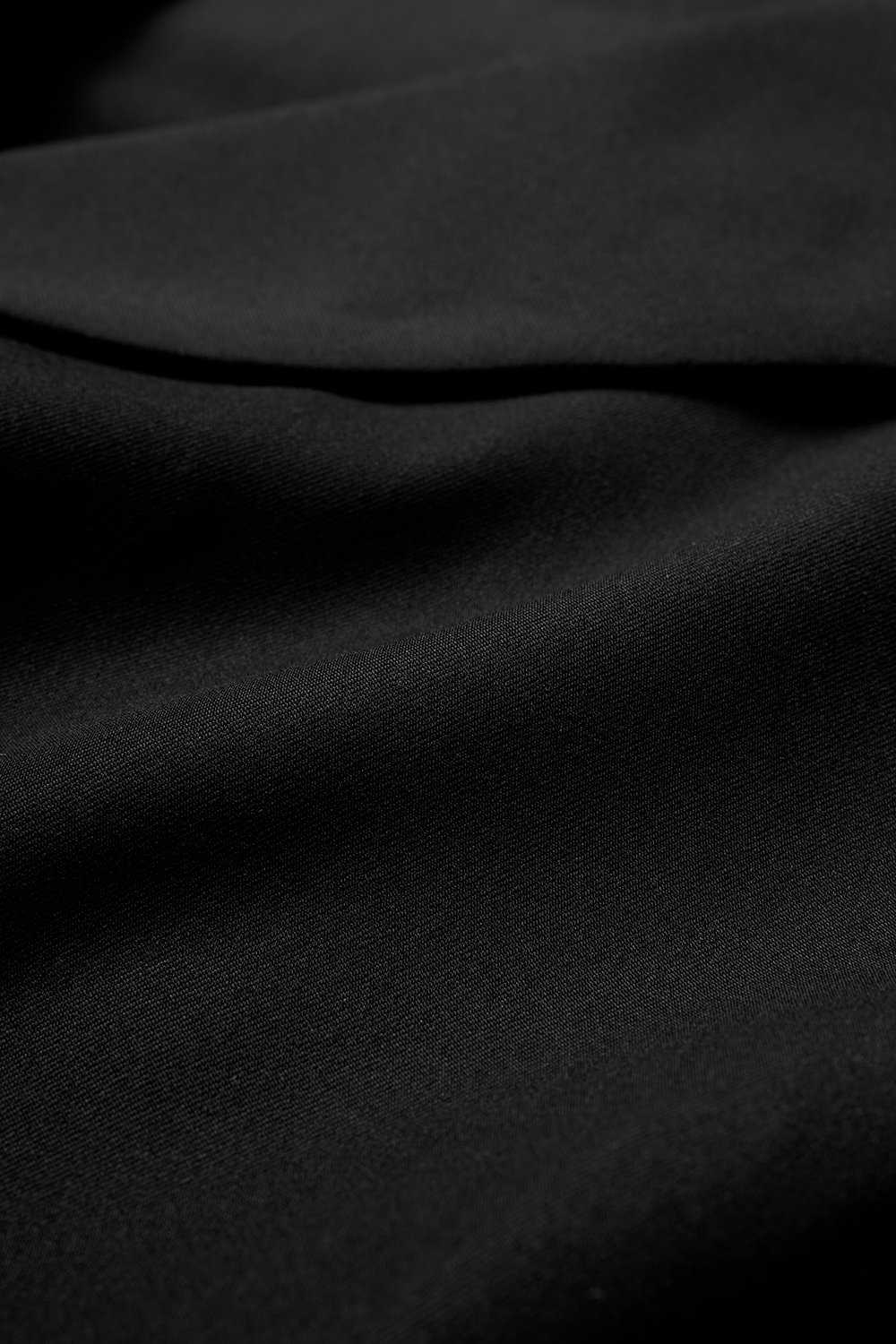 Louisa Padded Asymmetrical Collared Top in Classic Black