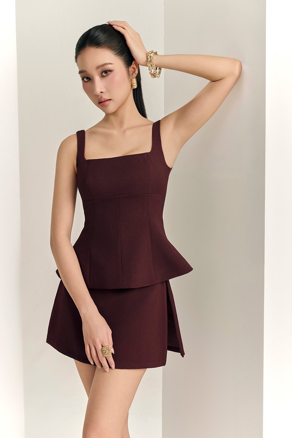 Seline Padded Peplum Top in Merlot