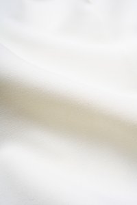 Avril Asymmetrical Cold Shoulder Top in Iconic White