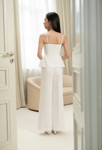 Regina Padded Twist Strappy Peplum Top in Iconic White