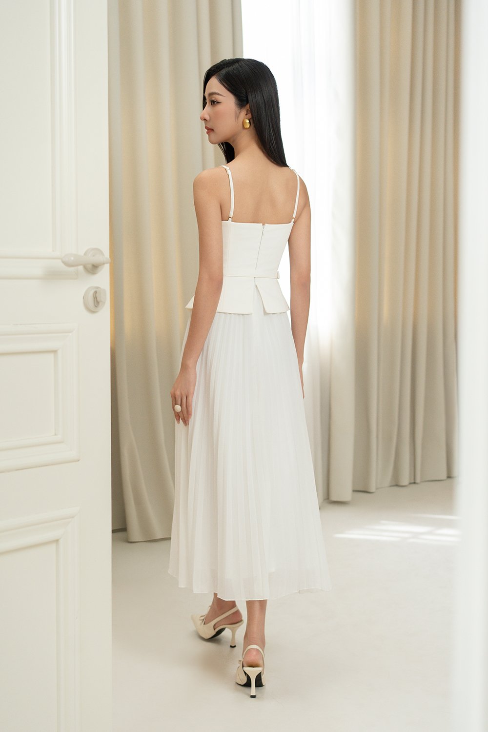 Cyrille Padded Peplum Pleated Dress in Iconic White
