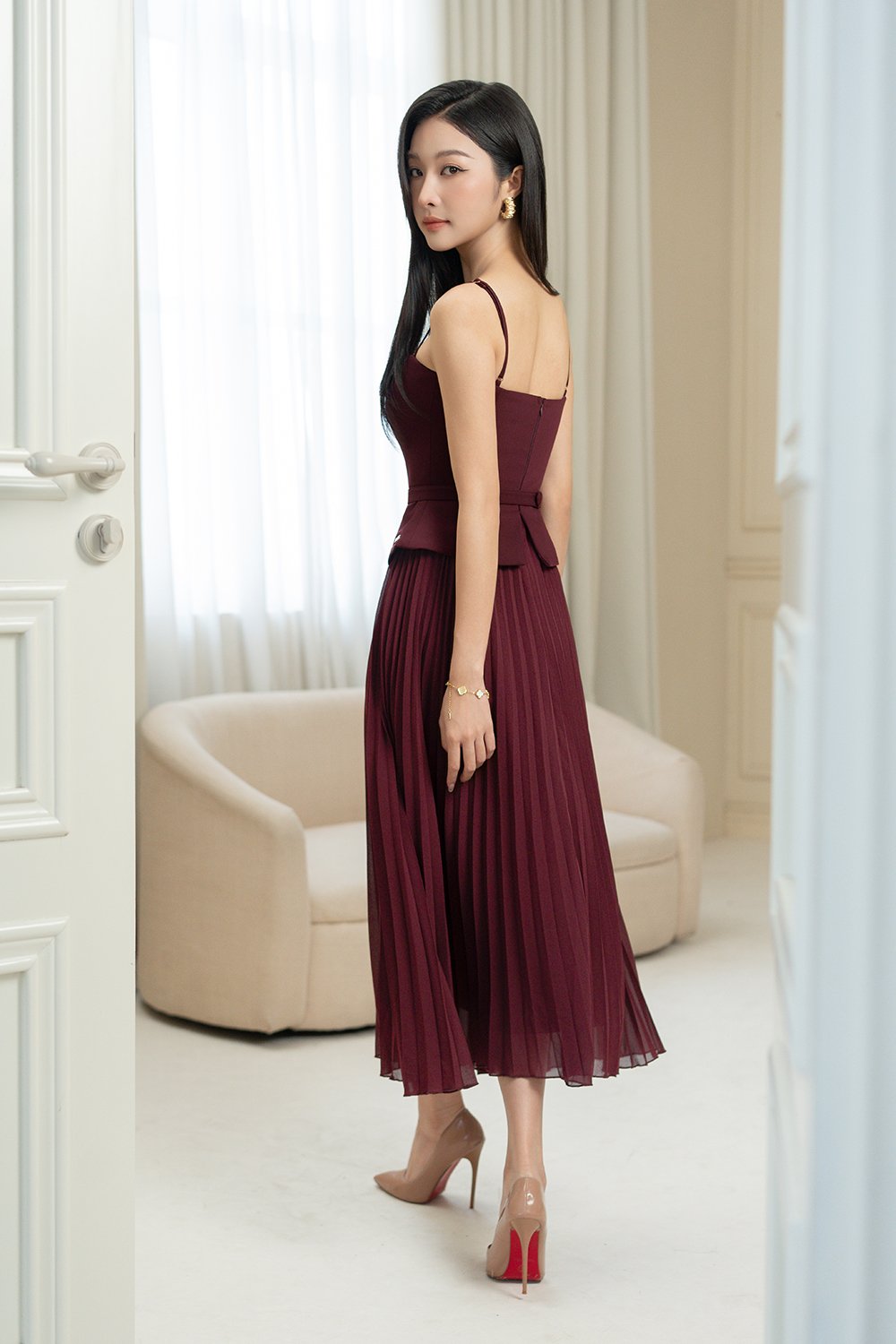 Cyrille Padded Peplum Pleated Dress in Wine Red