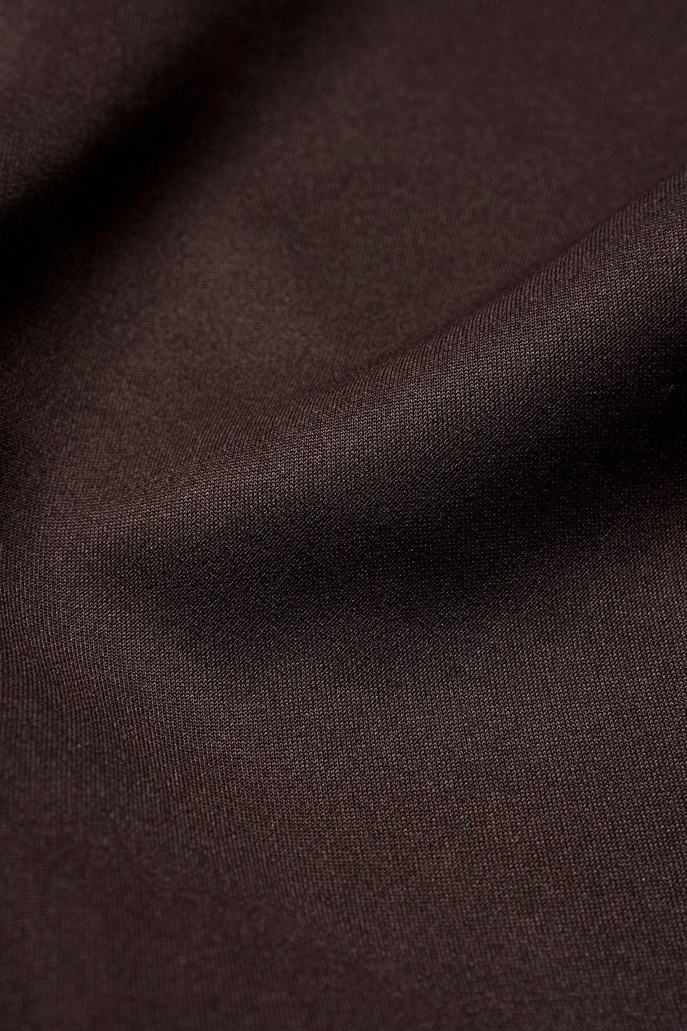 Eula Padded Asymmetrical Shoulder Crop Top in Plum Brown