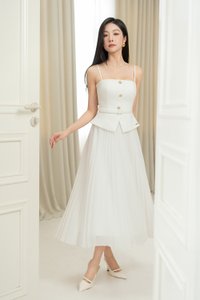 Cyrille Padded Peplum Pleated Dress in Iconic White