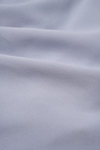 Isa Asymmetrical Shoulder Drape Top in Powder Blue