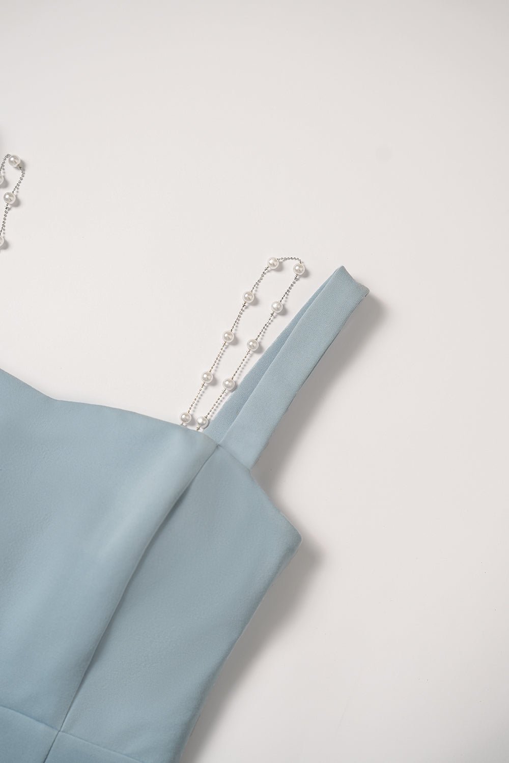 Aeagan Pearl Accented Twist Back Padded Midi Dress in Classic Black