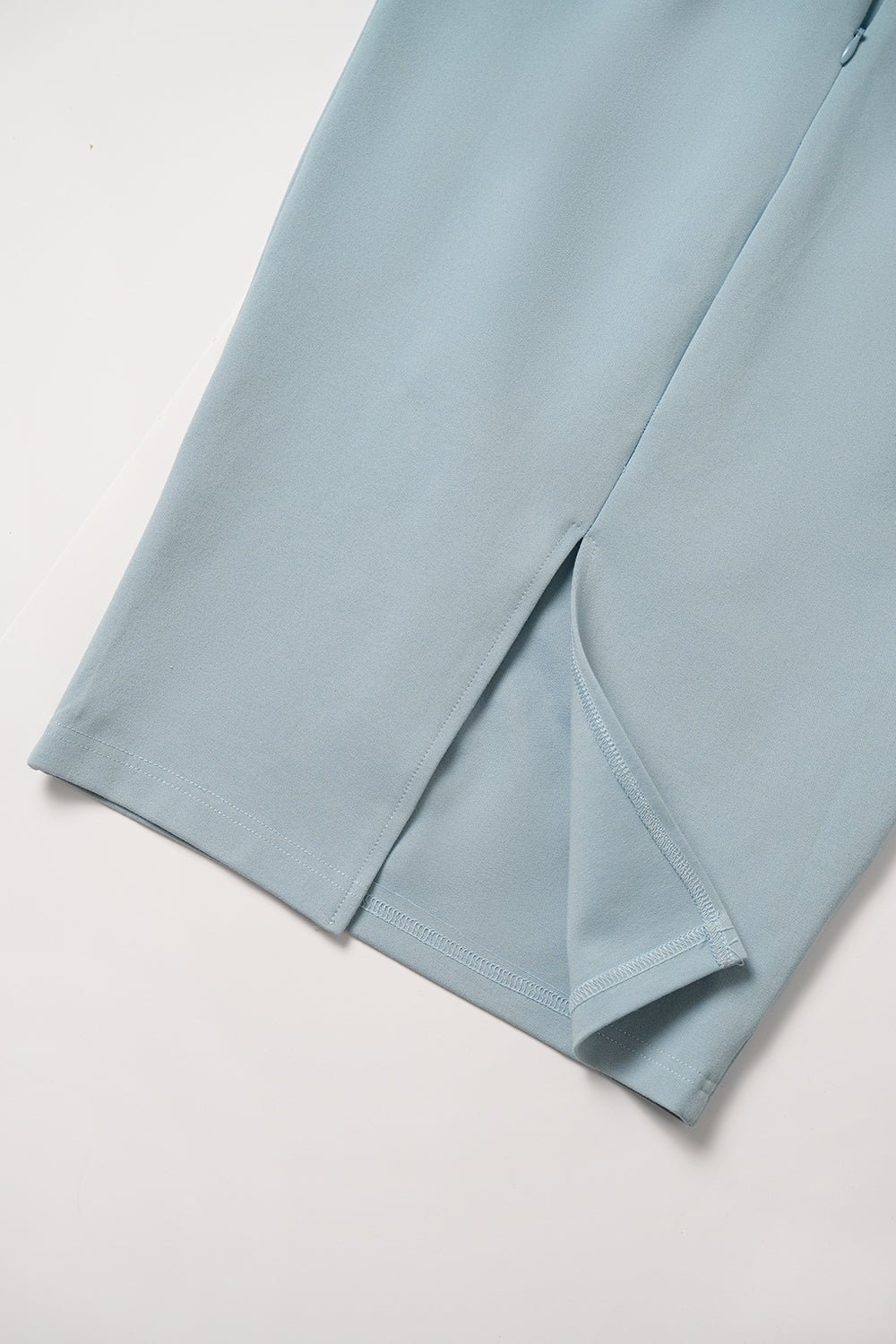 Aeagan Pearl Accented Twist Back Padded Midi Dress in Classic Black