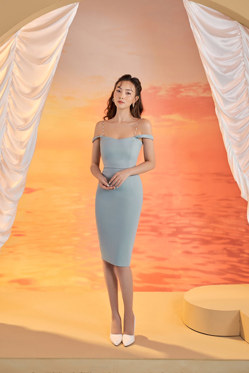 Aeagan Pearl Accented Twist Back Padded Midi Dress in Mediterranean Blue