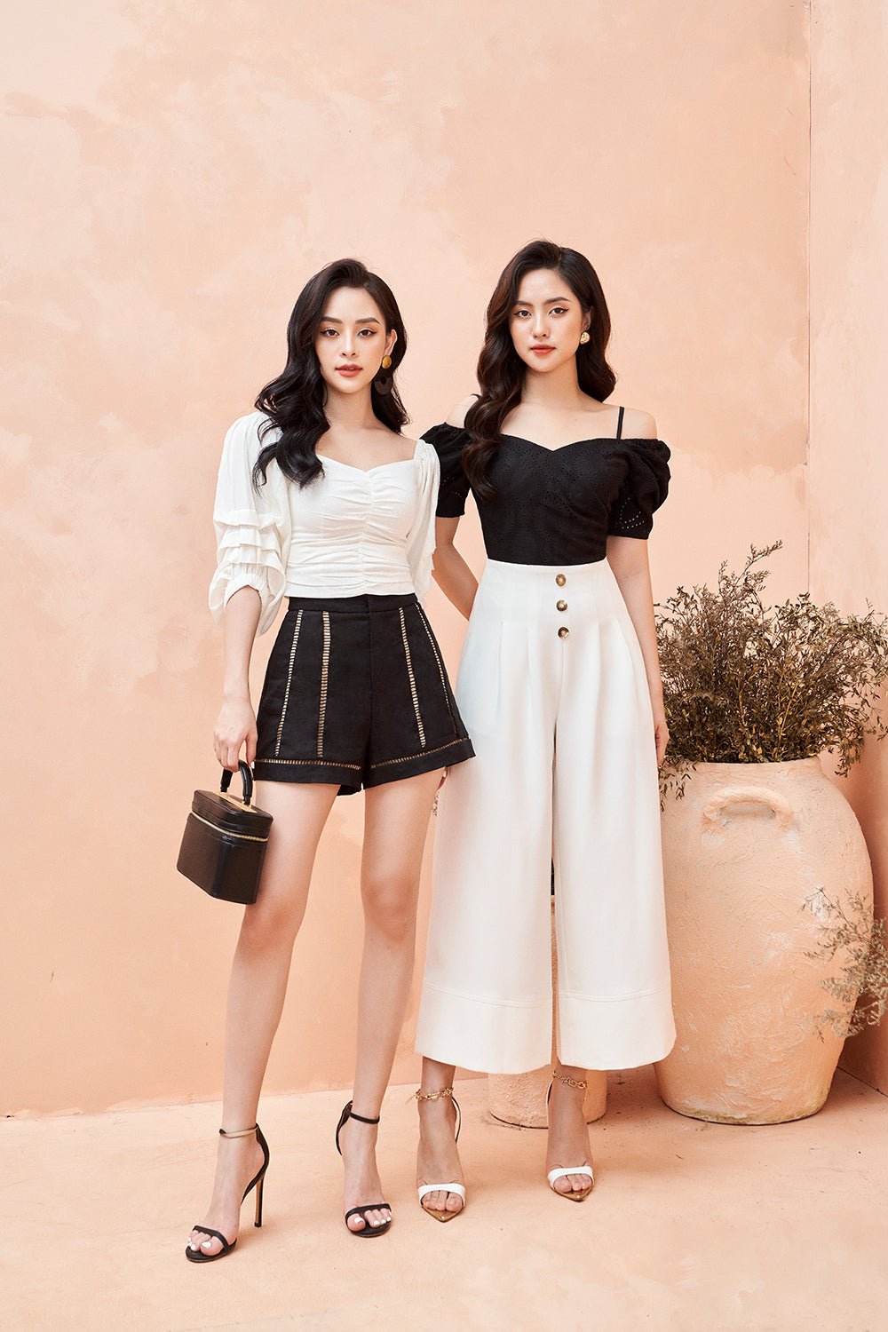 Claria Eyelet Puff Sleeves Top in Black (XS)