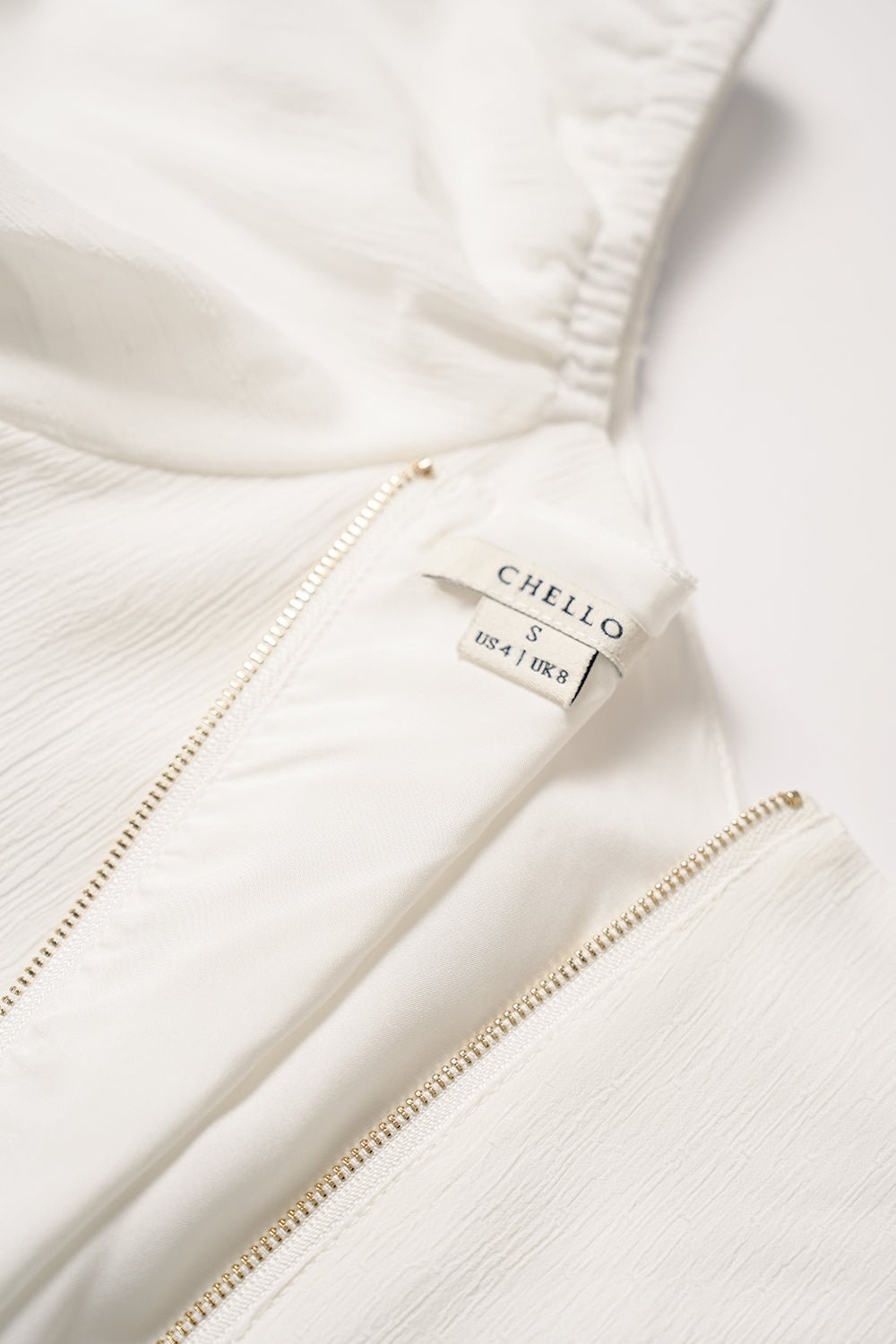 Etana Puff Shoulders Cut Out Top in Iconic White